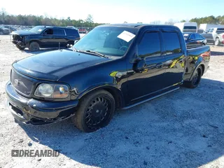 2002 Ford F-150 Harley Davidson with VIN 1FTRW07312KC24102, listed as a IAAI auction lot 41591917 with 1 mi miles. Bid and sale history available at carsss.com. Image 18.