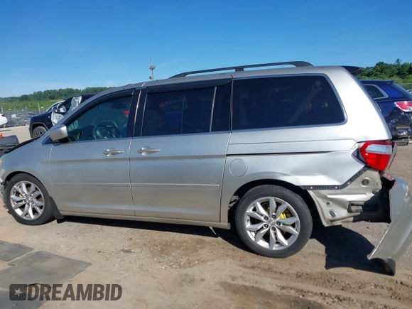 2005 Honda Odyssey EX z VIN 5FNRL38465B411189, wystawiony jako IAAI lot #42310199 z przebiegiem 304 142 mil mil oraz . Historia ofert i sprzedaży dostępna na DreamBid. Obrazek 14.