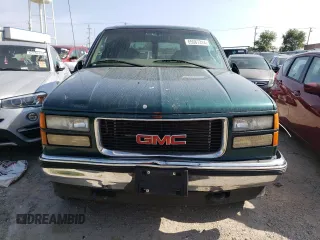 1998 GMC Yukon with VIN 1GKEK13RXWJ723572, listed as a Copart auction lot 65987314 with 237,503 mi miles and Salvage Title. Bid and sale history available at carsss.com. Image 5.
