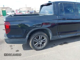 2017 Honda Ridgeline Sport with VIN 5FPYK2F11HB006113, listed as a IAAI auction lot 42419631 with 101,562 mi miles and . Bid and sale history available at DreamBid. Image 6.