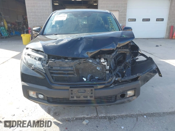 2020 Honda Ridgeline RTL with VIN 5FPYK3F59LB023212, listed as a IAAI auction lot 40704228 with 73,259 mi miles and . Bid and sale history available at DreamBid. Image 6.
