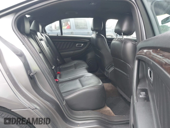 2014 Ford Taurus Limited with VIN 1FAHP2F8XEG115507, listed as a IAAI auction lot 42479603 with 160,986 mi miles and . Bid and sale history available at DreamBid. Image 8.