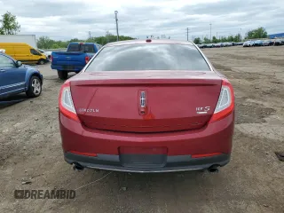2013 Lincoln MKS EcoBoost with VIN 1LNHL9FT1DG604990, listed as a Copart auction lot 57619245 with 76,899 mi miles and Clean title. Bid and sale history available at DreamBid. Image 6.