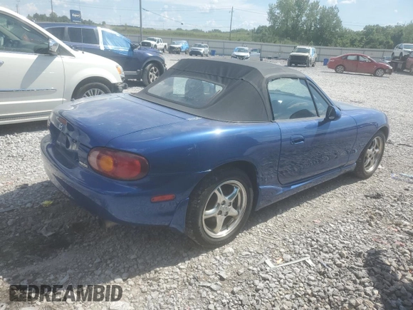 1999 Mazda MX-5 Miata with VIN JM1NB353XX0134898, listed as a Copart auction lot 63429475 with 140,595 mi miles and Clean title. Bid and sale history available at DreamBid. Image 3.
