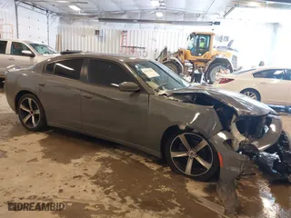 2017 Dodge Charger SE with VIN 2C3CDXBG0HH546619, listed as a IAAI auction lot 41617484 with 105,574 mi miles. Bid and sale history available at carsss.com. Image 1.