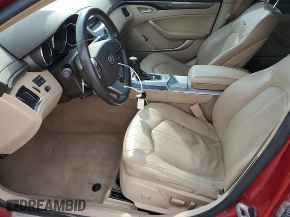 2012 Cadillac CTS Performance with VIN 1G6DJ5E34C0138842, listed as a Copart auction lot 77975404 with 120,883 mi miles and Salvage Title. Bid and sale history available at DreamBid. Image 7.
