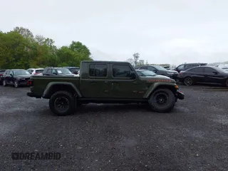 2023 Jeep Gladiator Mojave with VIN 1C6JJTEG6PL564504, listed as a IAAI auction lot 41752685 with 20,430 mi miles and . Bid and sale history available at DreamBid. Image 13.