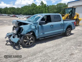 2023 Ford F-150 XL with VIN 1FTEW1CP7PKD02399, listed as a Copart auction lot 60738155 with 23,059 mi miles and Salvage title. Bid and sale history available at DreamBid. Image 1.