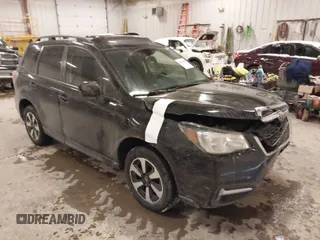 2018 Subaru Forester Premium with VIN JF2SJAGCXJH490690, listed as a IAAI auction lot 41607806 with 95,731 mi miles. Bid and sale history available at carsss.com. Image 1.