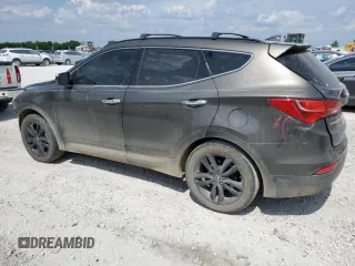 2013 Hyundai Santa Fe Sport z VIN 5XYZU3LA1DG098831, wystawiony jako Copart lot #55471553 z przebiegiem 178 576 mil mil oraz Czysty tytuł • Clean title. Historia ofert i sprzedaży dostępna na DreamBid. Obrazek 2.