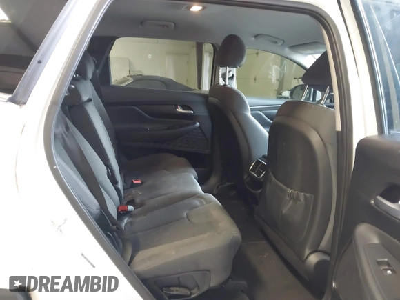 2019 Hyundai Santa Fe SE with VIN 5NMS23AD1KH063472, listed as a IAAI auction lot 41375650 with 64,496 mi miles and . Bid and sale history available at DreamBid. Image 8.