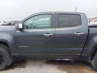 2017 Chevrolet Colorado 4WD LT z VIN 1GCGTCEN8H1304906, wystawiony jako IAAI lot #42652360 z przebiegiem 140 093 mil mil oraz . Historia ofert i sprzedaży dostępna na DreamBid. Obrazek 14.