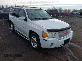 2008 GMC Envoy Denali with VIN 1GKET63M382216072, listed as a IAAI auction lot 41618044 with 148,598 mi miles. Bid and sale history available at carsss.com. Image 1.