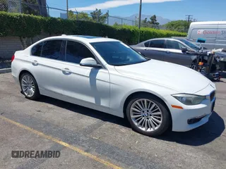 2012 BMW 3 Series 328i with VIN WBA3C1C57CF433959, listed as a IAAI auction lot 42691145 with 155,620 mi miles and . Bid and sale history available at DreamBid. Image 1.