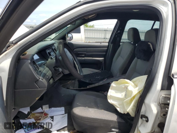 2010 Ford Police Interceptor with VIN 2FABP7BV9AX116618, listed as a Copart auction lot 60080275 with Not provided miles and Salvage title. Bid and sale history available at DreamBid. Image 7.