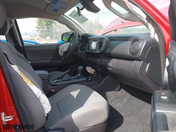 2018 Toyota Tacoma SR with VIN 5TFCZ5AN5JX156019, listed as a IAAI auction lot 38810875 with 76,805 mi miles. Bid and sale history available at carsss.com. Image 5.