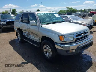 2000 Toyota 4Runner SR5 z VIN JT3HN86R9Y0289629, wystawiony jako IAAI lot #42167378 z przebiegiem 232 074 mil mil oraz . Historia ofert i sprzedaży dostępna na DreamBid. Obrazek 1.