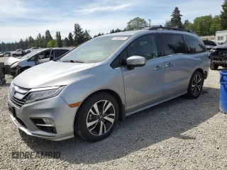 2018 Honda Odyssey Elite with VIN 5FNRL6H95JB076708, listed as a Copart auction lot 54906505 with 88,251 mi miles and Salvage title. Bid and sale history available at DreamBid. Image 1.