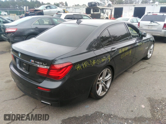2013 BMW 7 Series 750Li xDrive with VIN WBAYF8C51DD140657, listed as a IAAI auction lot 32751348 with 128,816 mi miles. Bid and sale history available at carsss.com. Image 4.