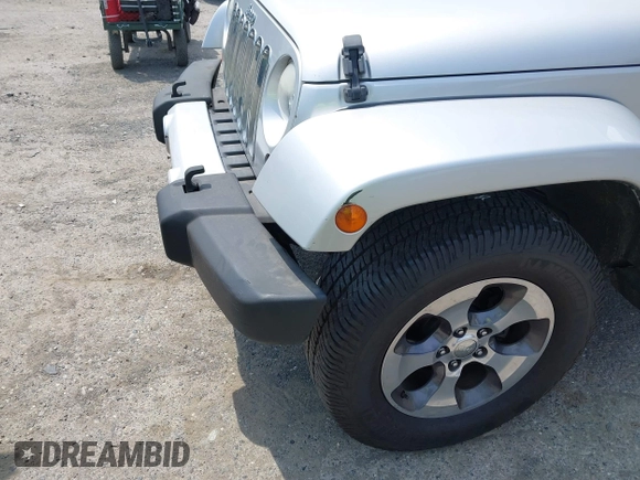 2012 Jeep Wrangler Unlimited Altitude with VIN 1C4HJWEG2CL140059, listed as a IAAI auction lot 42433563 with 189,868 mi miles and . Bid and sale history available at DreamBid. Image 6.