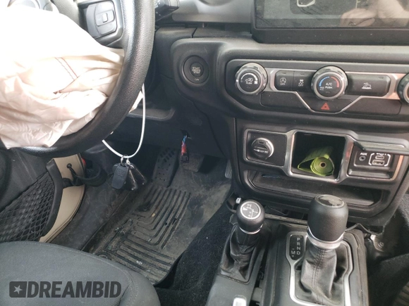 2020 Jeep Gladiator Sport S с VIN 1C6HJTAG5LL173357, выставлен на аукционе Copart как лот 55679915 с пробегом Не указан миль и Списание • Salvage title. История ставок и продаж доступна на DreamBid. Изображение 7.