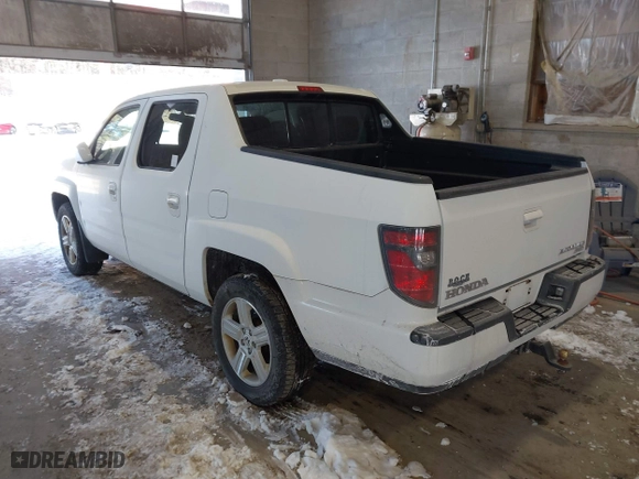 2014 Honda Ridgeline RTL with VIN 5FPYK1F55EB012490, listed as a IAAI auction lot 41391884 with 130,121 mi miles. Bid and sale history available at carsss.com. Image 3.