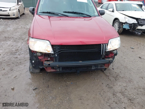 2005 Mercury Mariner Luxury with VIN 4M2YU57145DJ07713, listed as a IAAI auction lot 41678767 with 71,981 mi miles. Bid and sale history available at carsss.com. Image 6.