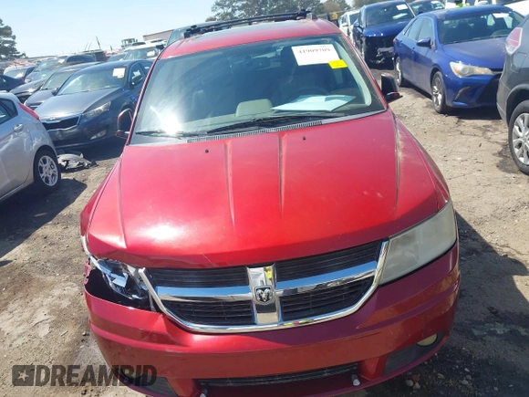 2009 Dodge Journey SXT with VIN 3D4GG57V39T522388, listed as a IAAI auction lot 41909709 with 208,738 mi miles. Bid and sale history available at carsss.com. Image 12.