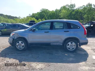 2010 Honda CR-V LX with VIN 3CZRE3H39AG701619, listed as a IAAI auction lot 41986031 with 107,200 mi miles and . Bid and sale history available at DreamBid. Image 14.