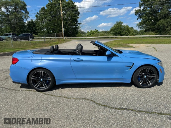 2015 BMW M4 with VIN WBS3U9C56FP967640, listed as a Copart auction lot 63641785 with 31,516 mi miles and Salvage title. Bid and sale history available at DreamBid. Image 13.