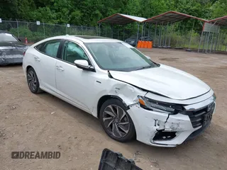 2022 Honda Insight Touring z VIN 19XZE4F95NE004694, wystawiony jako IAAI lot #42253089 z przebiegiem 40 142 mil mil oraz . Historia ofert i sprzedaży dostępna na DreamBid. Obrazek 1.