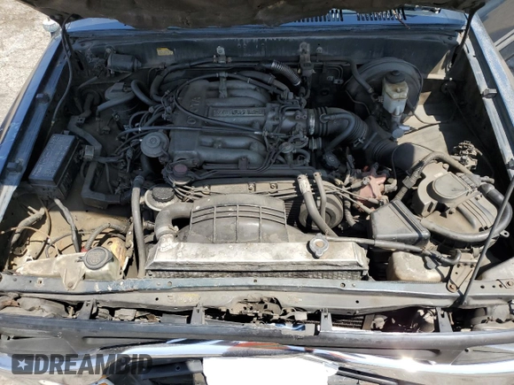 1994 Toyota Pickup z VIN JT4VN93D7R5043017, wystawiony jako Copart lot #55316015 z przebiegiem 149 112 mil mil oraz Szkoda całkowita • Salvage title. Historia ofert i sprzedaży dostępna na DreamBid. Obrazek 11.