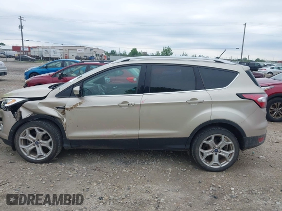 2018 Ford Escape Titanium with VIN 1FMCU9J94JUA44964, listed as a IAAI auction lot 42494471 with 100,955 mi miles and . Bid and sale history available at DreamBid. Image 14.