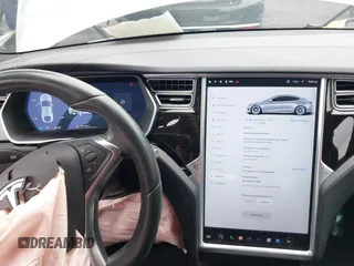 2017 Tesla Model S 100D with VIN 5YJSA1E24HF193563, listed as a IAAI auction lot 42120120 with 60,391 mi miles and . Bid and sale history available at DreamBid. Image 19.