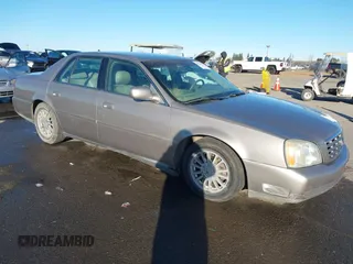 2003 Cadillac DeVille DHS z VIN 1G6KE54Y63U290204, wystawiony jako IAAI lot #41273112 z przebiegiem 110 124 mil mil oraz . Historia ofert i sprzedaży dostępna na DreamBid. Obrazek 1.