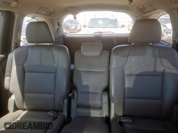 2015 Honda Odyssey Touring Elite z VIN 5FNRL5H97FB002739, wystawiony jako Copart lot #62060695 z przebiegiem 194 604 mil mil oraz Szkoda całkowita • Salvage title. Historia ofert i sprzedaży dostępna na DreamBid. Obrazek 10.