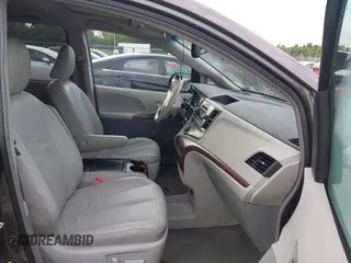 2014 Toyota Sienna XLE with VIN 5TDYK3DC0ES496716, listed as a IAAI auction lot 42494549 with 158,645 mi miles and . Bid and sale history available at DreamBid. Image 5.