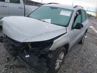2016 Volkswagen Tiguan SEL with VIN WVGAV7AXXGW534068, listed as a IAAI auction lot 41596440 with 85,022 mi miles and . Bid and sale history available at DreamBid. Image 2.