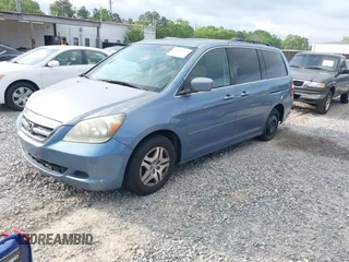 2007 Honda Odyssey EX with VIN 5FNRL38457B037239, listed as a IAAI auction lot 42034219 with 291,885 mi miles. Bid and sale history available at carsss.com. Image 2.