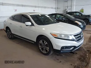2014 Honda Crosstour EX-L with VIN 5J6TF2H58EL002246, listed as a IAAI auction lot 42086143 with 70,986 mi miles. Bid and sale history available at carsss.com. Image 1.