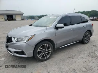 2017 Acura MDX Advance z VIN 5FRYD4H92HB024703, wystawiony jako Copart lot #61019565 z przebiegiem 126 275 mil mil oraz Czysty tytuł • Clean title. Historia ofert i sprzedaży dostępna na DreamBid. Obrazek 1.