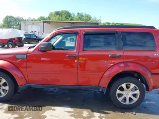 2010 Dodge Nitro Heat z VIN 1D4PU4GK5AW174777, wystawiony jako IAAI lot #42290362 z przebiegiem 165 537 mil mil oraz . Historia ofert i sprzedaży dostępna na DreamBid. Obrazek 14.
