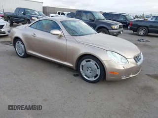 2003 Lexus SC with VIN JTHFN48Y430043403, listed as a IAAI auction lot 42057878 with 69,691 mi miles. Bid and sale history available at carsss.com. Image 1.