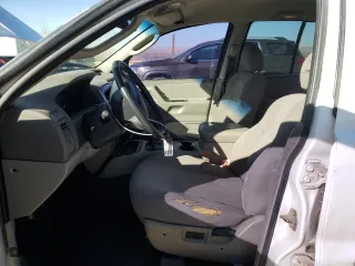 2002 Jeep Grand Cherokee Laredo with VIN 1J4GW48S72C298133, listed as a Copart auction lot 43973315 with 266,437 mi miles and Salvage Title. Bid and sale history available at carsss.com. Image 7.
