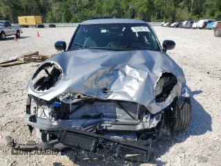 2025 MINI Hardtop Cooper S with VIN WMW23GD00S2W74060, listed as a Copart auction lot 52106175 with 410 mi miles and Salvage Title. Bid and sale history available at DreamBid. Image 5.