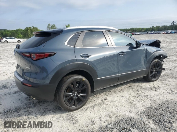 2024 Mazda CX-30 S Carbon Edition с VIN 3MVDMBCMXRM604194, выставлен на аукционе Copart как лот 54777125 с пробегом 9 816 миль миль и Списание • Salvage title. История ставок и продаж доступна на DreamBid. Изображение 3.