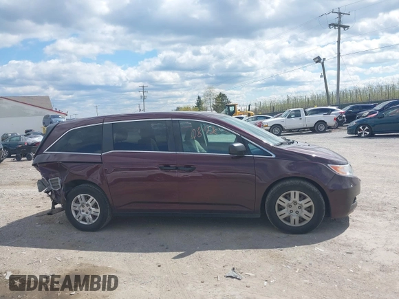 2013 Honda Odyssey LX with VIN 5FNRL5H28DB058401, listed as a IAAI auction lot 42050892 with 221,016 mi miles and . Bid and sale history available at carsss.com. Image 13.