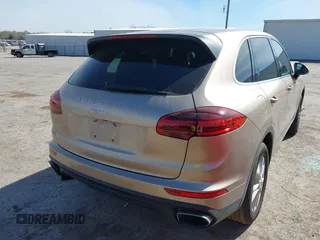 2016 Porsche Cayenne z VIN WP1AA2A2XGKA15096, wystawiony jako IAAI lot #41868566 z przebiegiem 93 640 mil mil oraz . Historia ofert i sprzedaży dostępna na DreamBid. Obrazek 4.