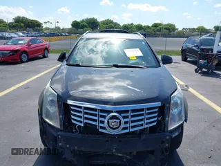 2013 Cadillac SRX Premium Collection with VIN 3GYFNEE34DS535613, listed as a IAAI auction lot 42336365 with 106,426 mi miles and . Bid and sale history available at DreamBid. Image 13.