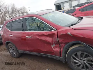 2016 Nissan Rogue SV with VIN 5N1AT2MV0GC783337, listed as a IAAI auction lot 41641993 with 136,084 mi miles and . Bid and sale history available at DreamBid. Image 13.